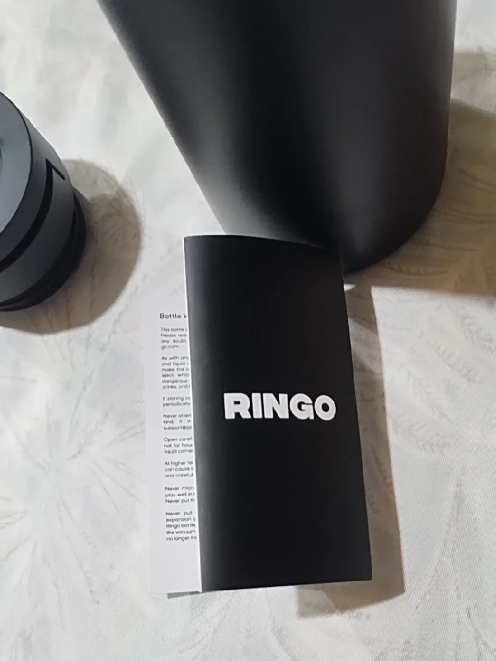 Ringo NWT Magnetic Water Bottle, Cell Phone Holder.